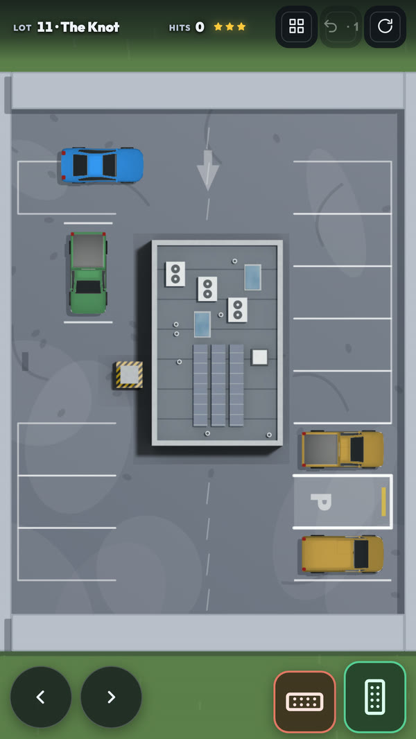 Tight Spot lot 11, The Knot: a bay squeezed between two yellow vans behind a building